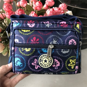 批发地摊包斜挎包女士休闲帆布妈咪包单肩包老年人花布包