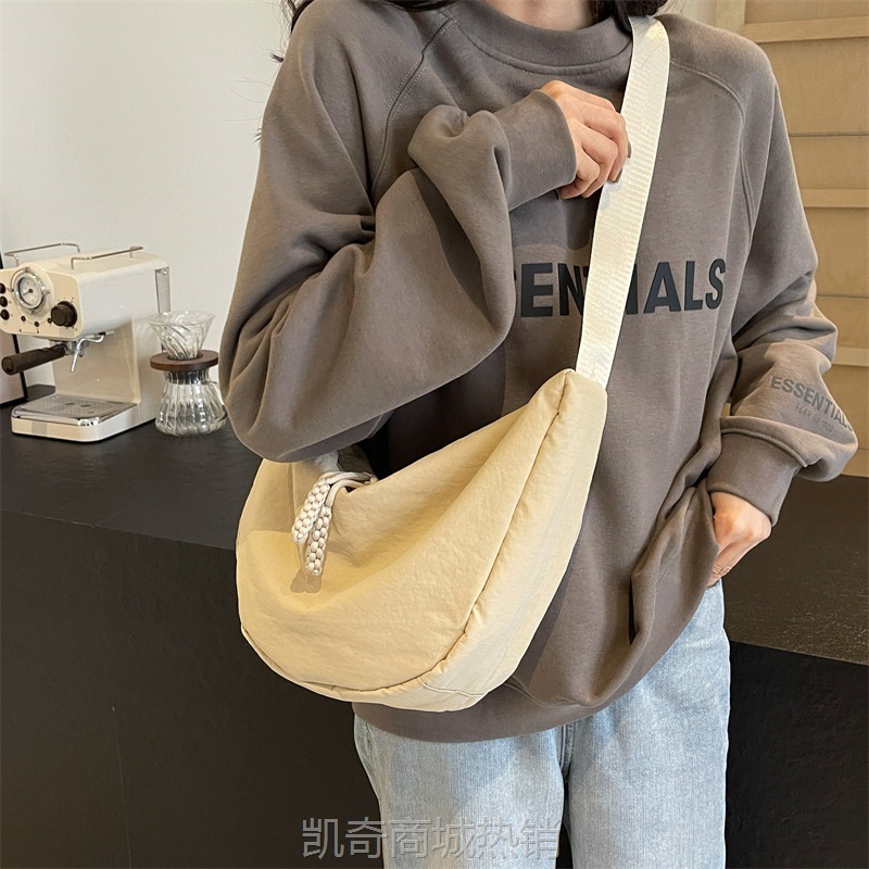 跨境外贸女式斜挎包休闲百搭单肩包韩日版小众饺子大容量简约布包