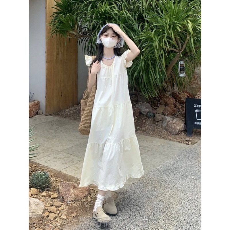 白色小飞袖吊带连衣裙女夏小个子亮色新疆南法海边度假风沙滩长裙