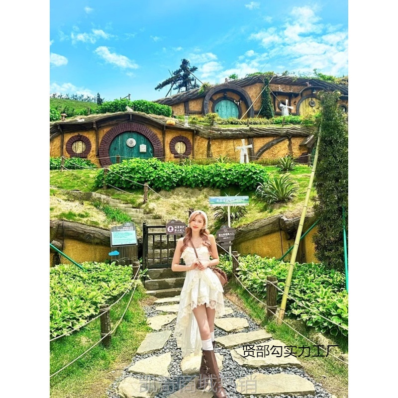 新疆原大西北川西旅游穿搭女装甜辣风前短后长不规则吊带连衣裙