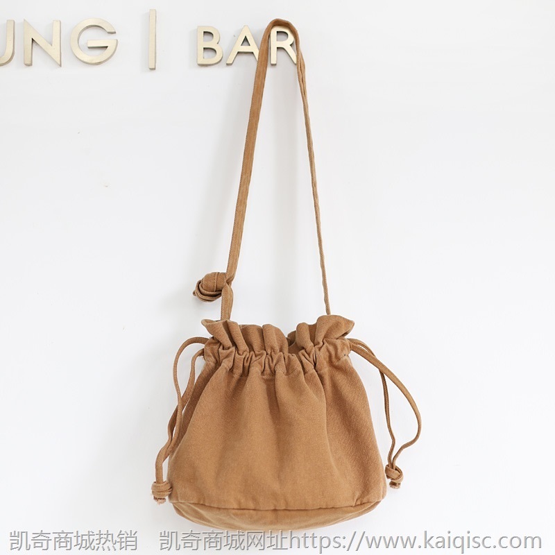 韩版网红抽带水桶包休闲简约复古斜挎女包可爱森系文艺帆布单肩包