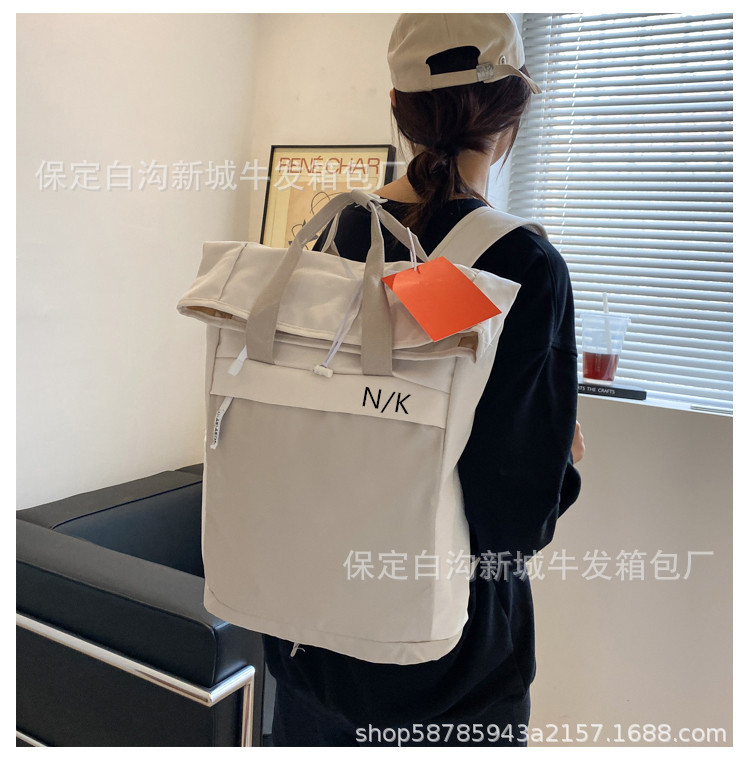 NK新款卷皮学生书包电脑包夏季束口双肩包男旅行豆沙包女街头韩版