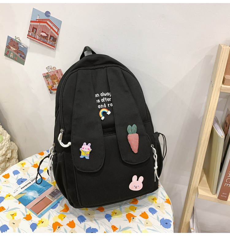 兔耳朵双肩包韩版2021新款可爱卡通中学生书包少女大容量双背包