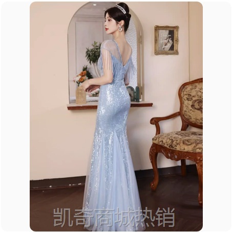 蓝色亮片晚礼服女2024新款鱼尾流苏高端轻奢小众艺考年会主持人裙