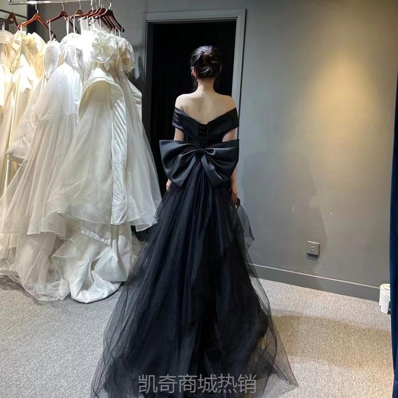 黑色礼服裙2024新款一字肩法式轻奢小众鱼尾裙高级感高定缎面礼服