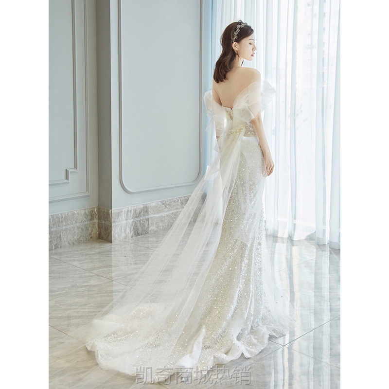 鱼尾轻婚纱2024新款新娘一字肩亮片仙气质拖尾出门纱年会主持礼服