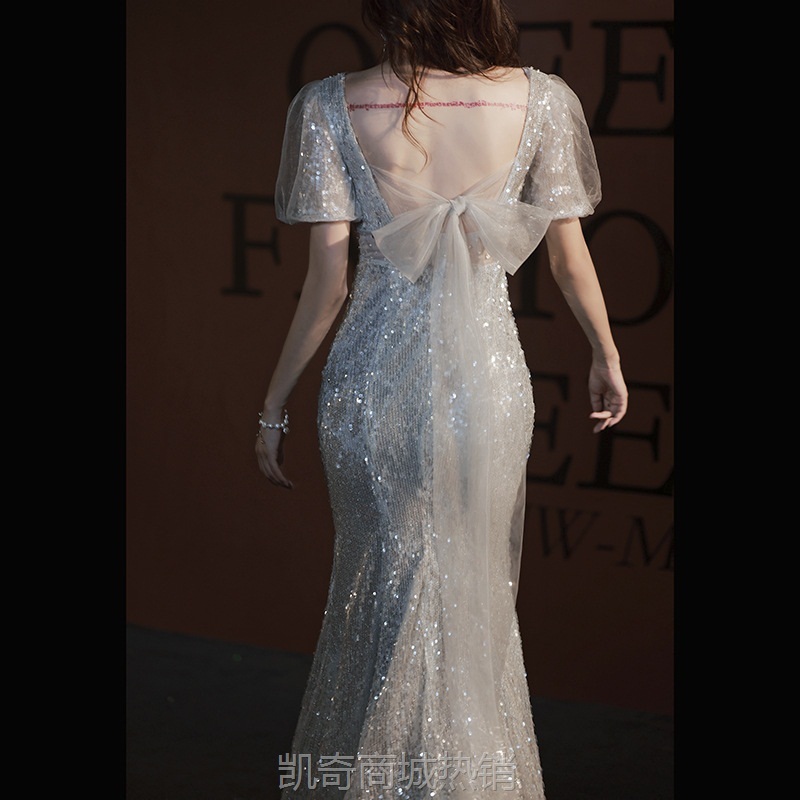 晚礼服裙女新款2024鱼尾设计感名媛轻奢小众银色亮片V领宴会礼服